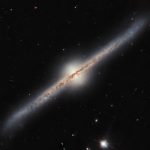 NASA's Hubble Space Telescope Captured Image Reveals a Glimpse of the Spiral Galaxy UGC 10043 - Image